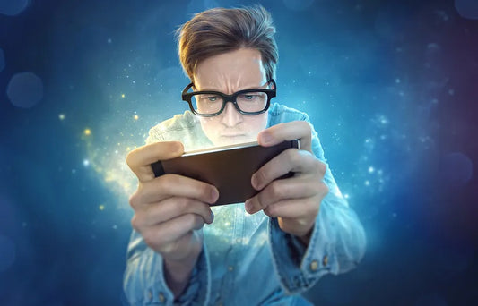 Man on phone using Safe-Glasses to be protected from blue light