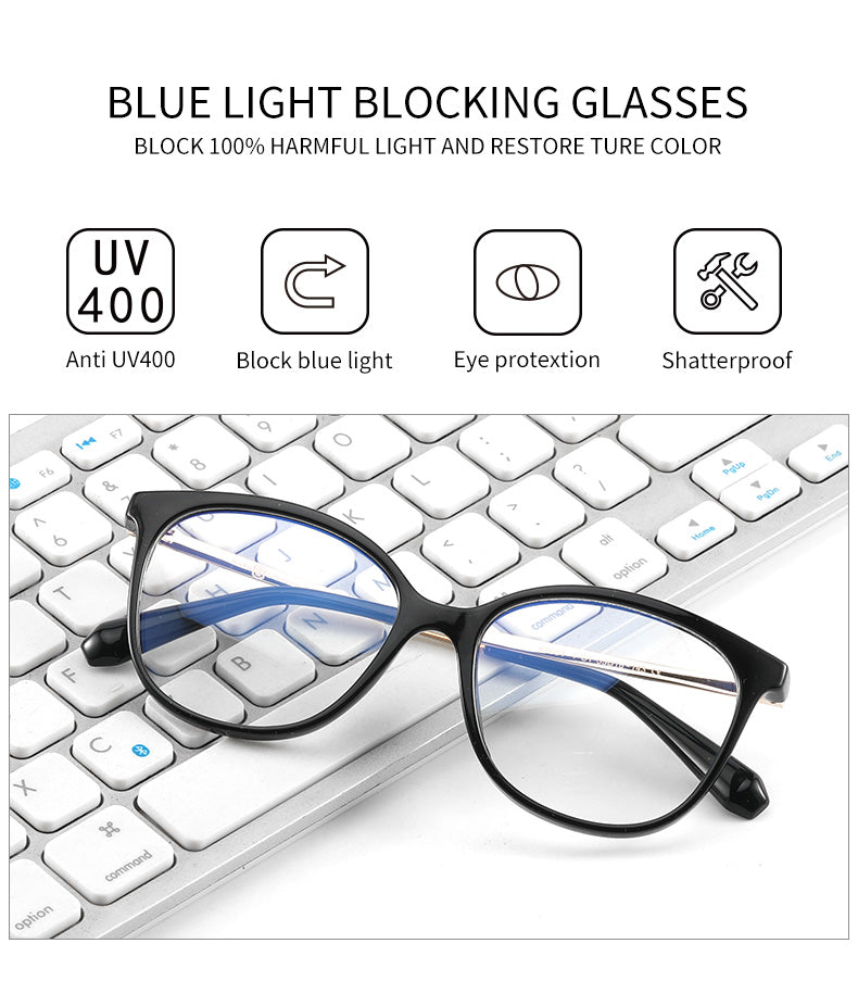 A modern woman wearing anti-blue light glasses while working on her laptop
